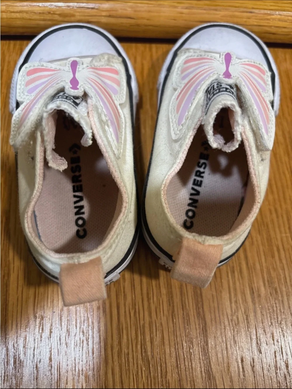 Converse Kids Slip-On Sneakers with Pink Butterfly Accents - Cream